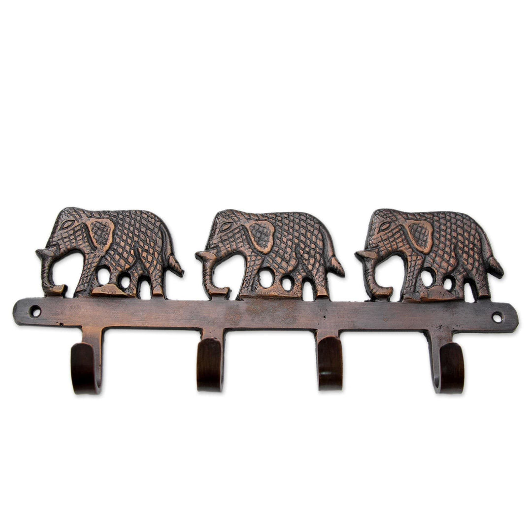 Handmade Brass Key Holder 'Adventurous Elephants' (India) Brown