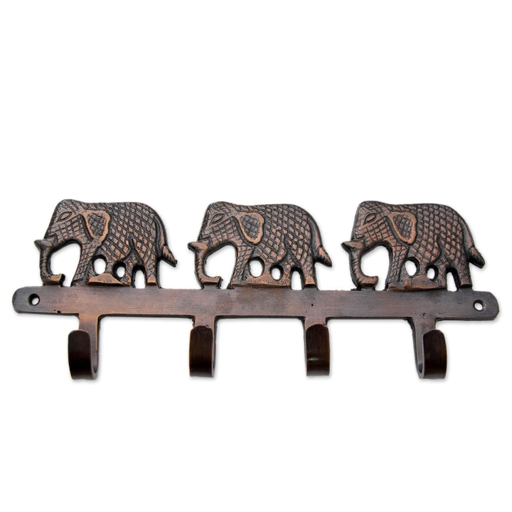 Handmade Brass Key Holder 'Adventurous Elephants' (India) Brown