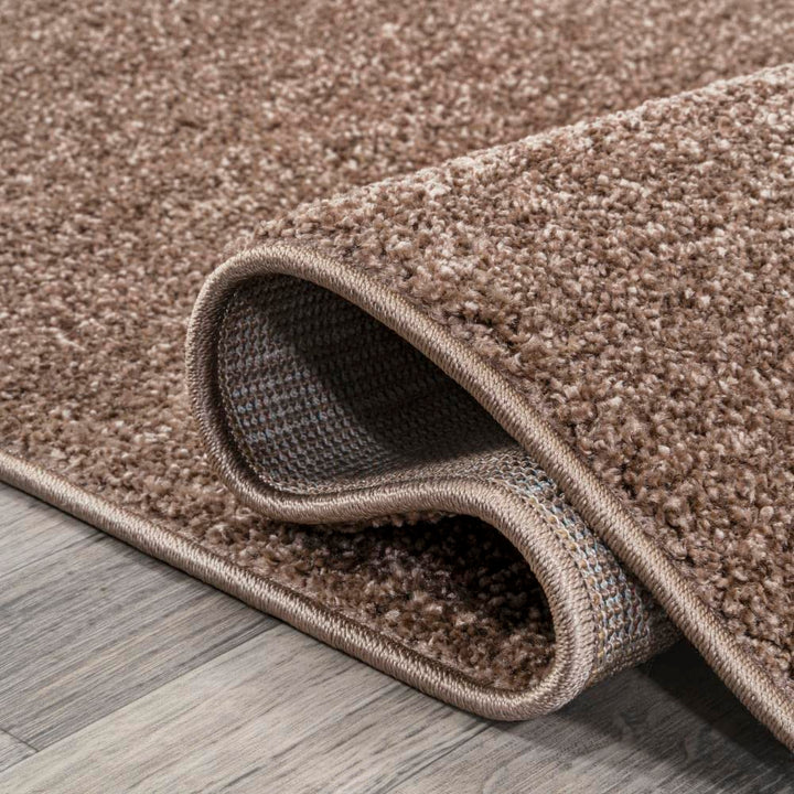 JONATHAN Y Tumbling Solid Low-Pile Area Rug