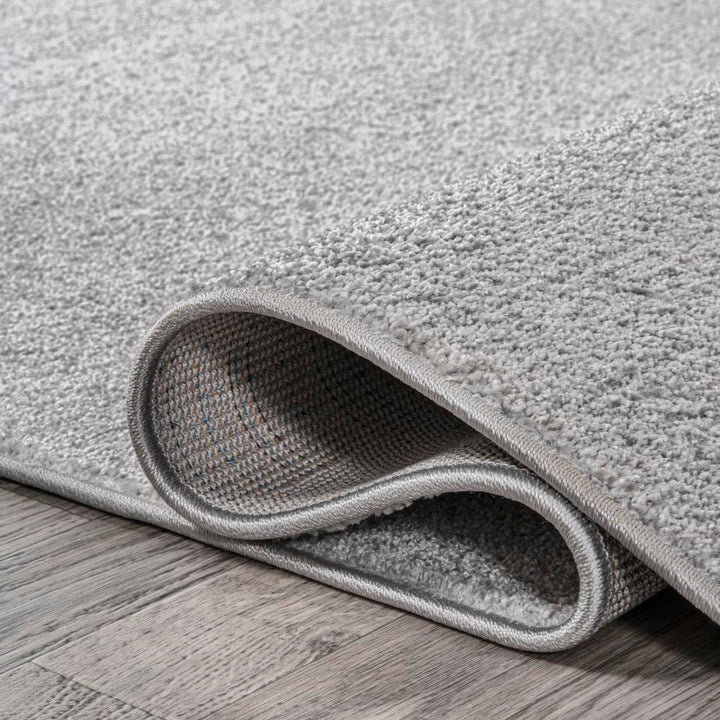 JONATHAN Y Tumbling Solid Low-Pile Area Rug