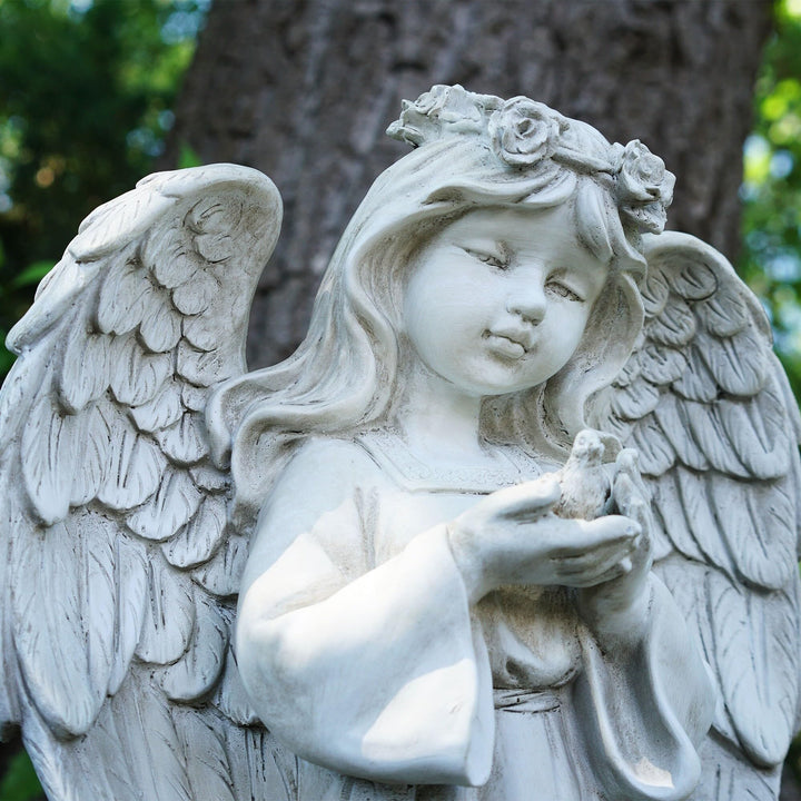 20.5" White Standing Angel Holding A Bird Outdoor Garden Statue Resin - Diamond Home USA