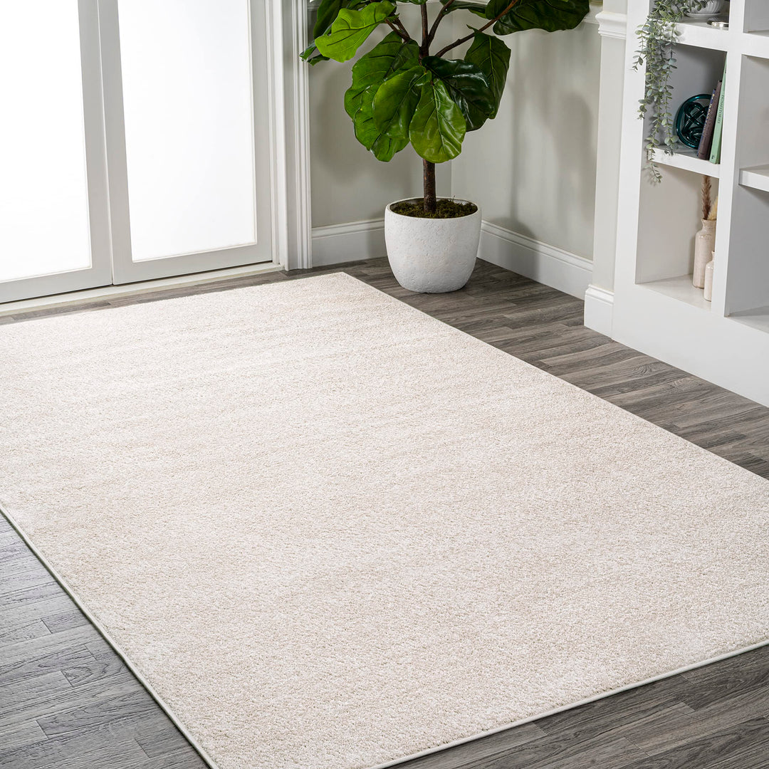 JONATHAN Y Tumbling Solid Low-Pile Area Rug