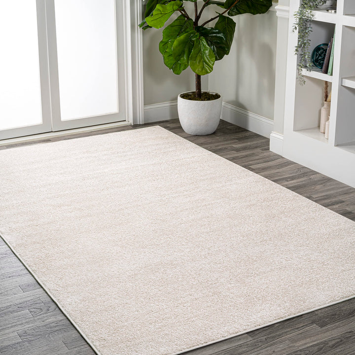 JONATHAN Y Tumbling Solid Low-Pile Area Rug