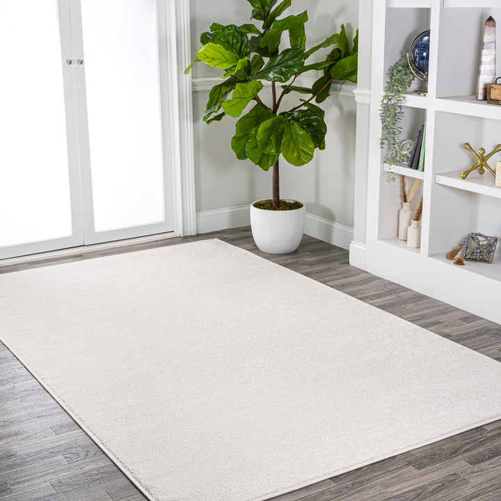 JONATHAN Y Tumbling Solid Low-Pile Area Rug