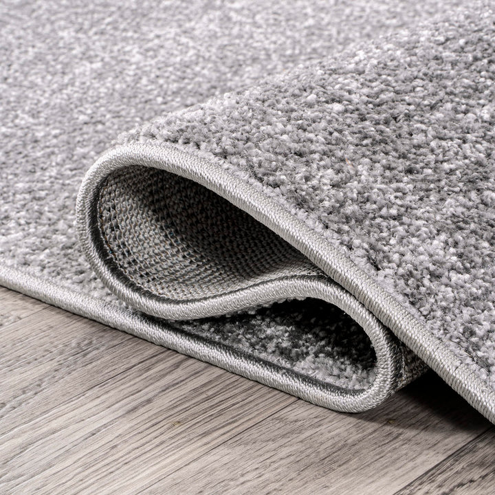 JONATHAN Y Tumbling Solid Low-Pile Area Rug