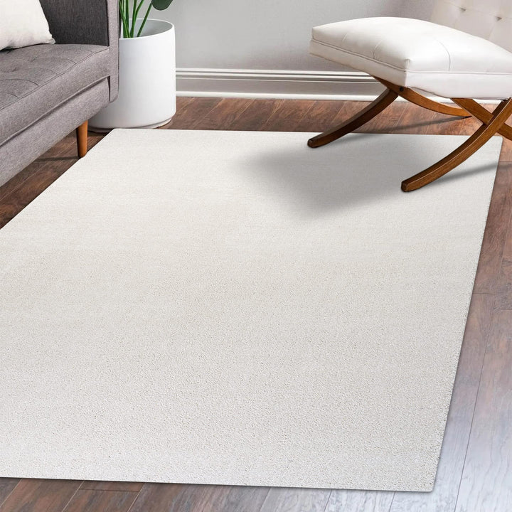 JONATHAN Y Tumbling Solid Low-Pile Area Rug