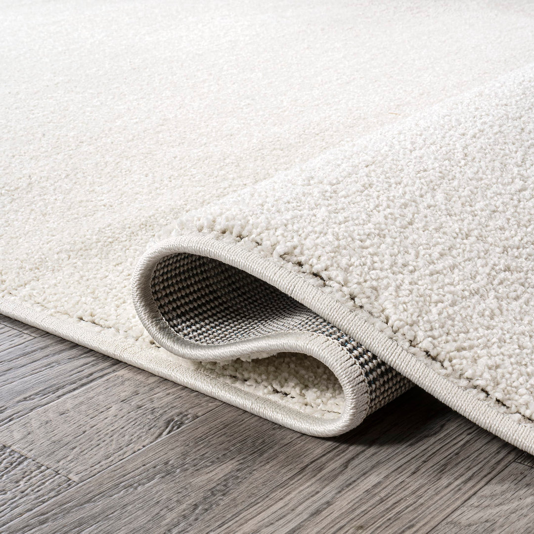 JONATHAN Y Tumbling Solid Low-Pile Area Rug