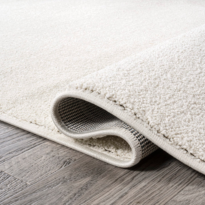 JONATHAN Y Tumbling Solid Low-Pile Area Rug