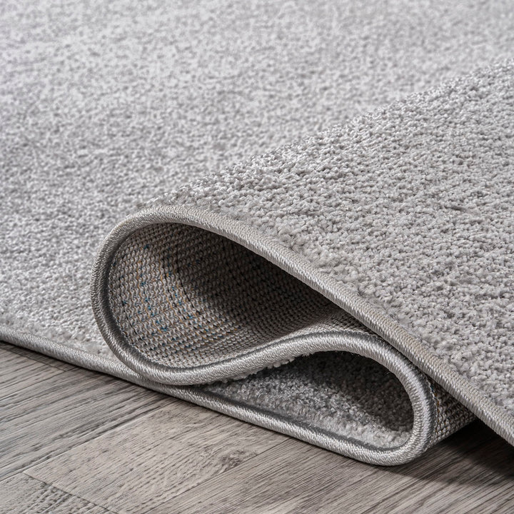 JONATHAN Y Tumbling Solid Low-Pile Area Rug