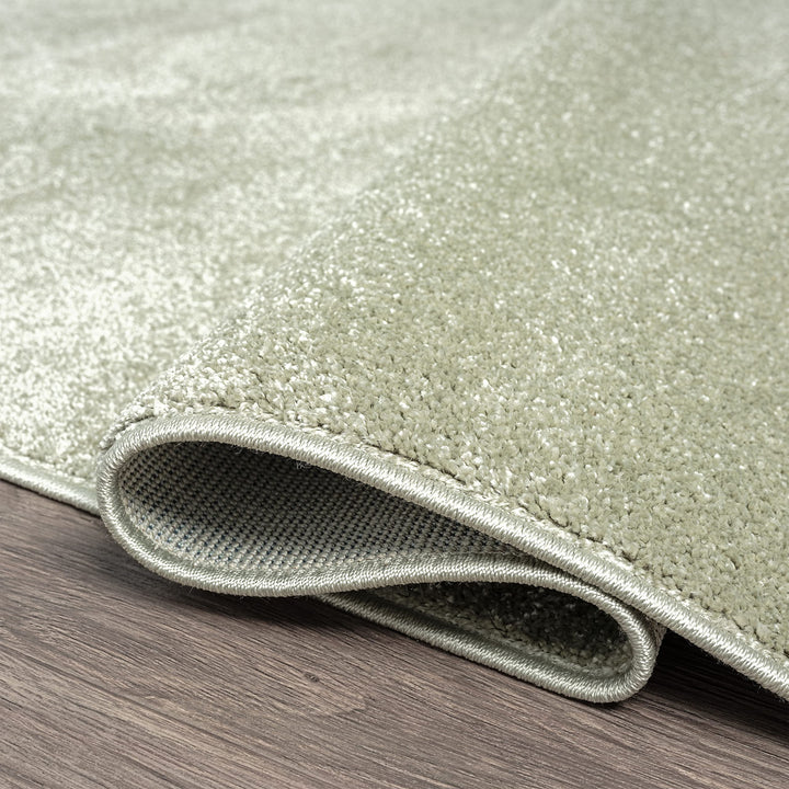JONATHAN Y Tumbling Solid Low-Pile Area Rug