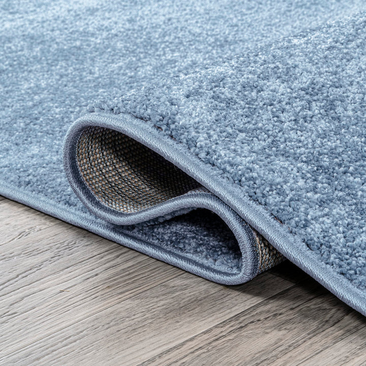 JONATHAN Y Tumbling Solid Low-Pile Area Rug