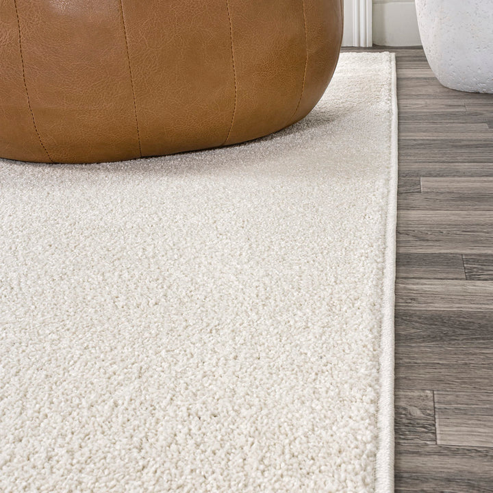 JONATHAN Y Tumbling Solid Low-Pile Area Rug