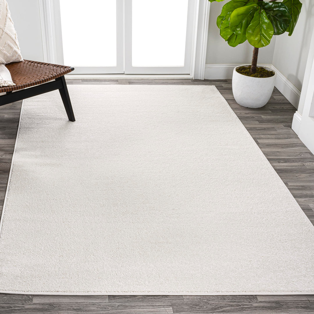 JONATHAN Y Tumbling Solid Low-Pile Area Rug