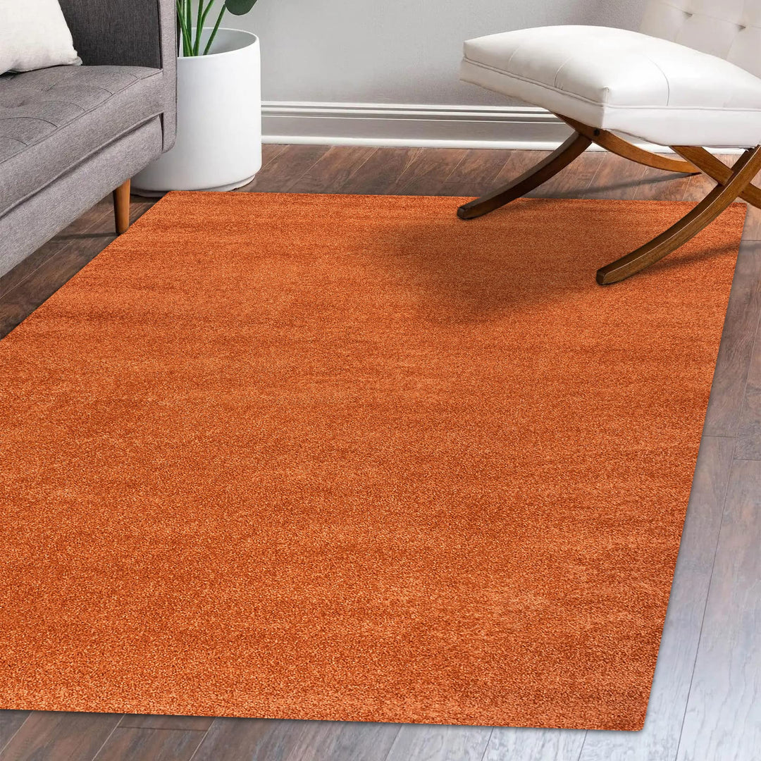 JONATHAN Y Tumbling Solid Low-Pile Area Rug