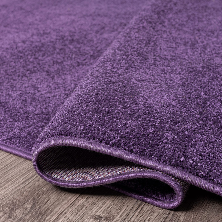 JONATHAN Y Tumbling Solid Low-Pile Area Rug