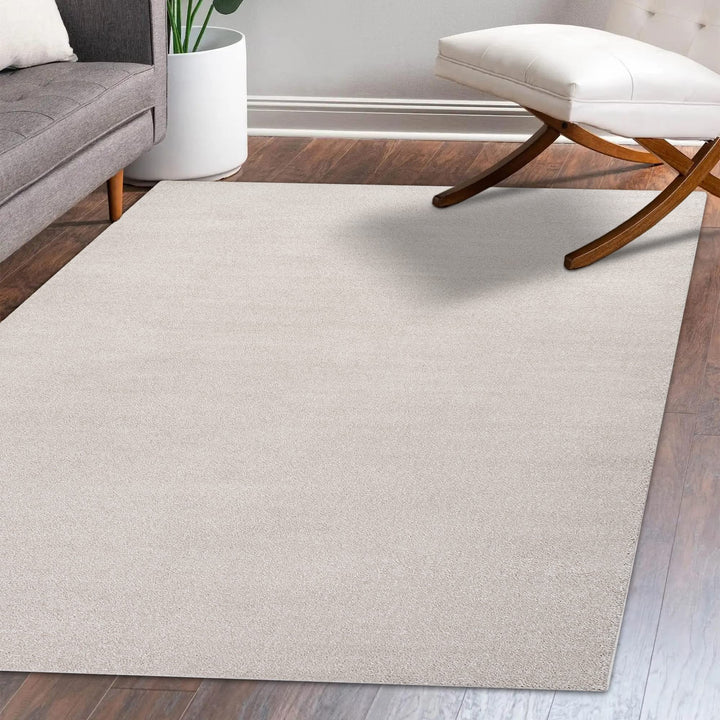 JONATHAN Y Tumbling Solid Low-Pile Area Rug
