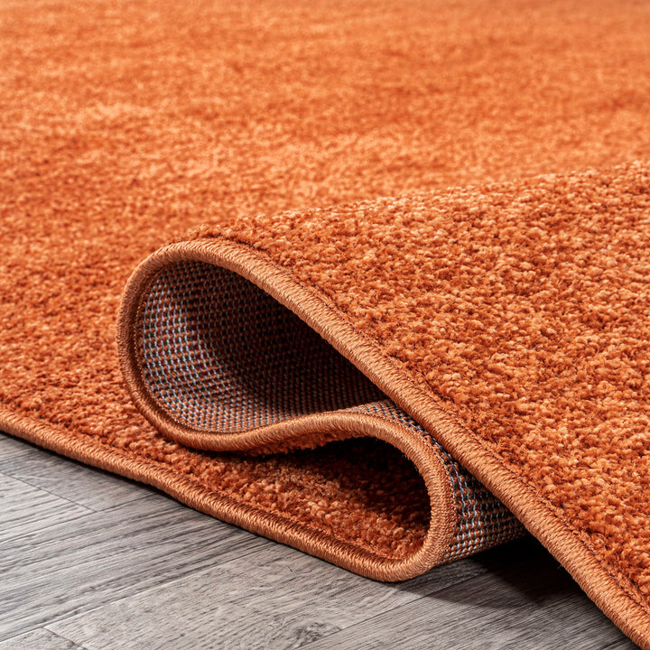 JONATHAN Y Tumbling Solid Low-Pile Area Rug