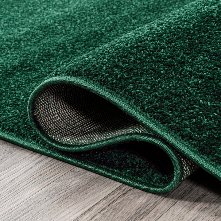 JONATHAN Y Tumbling Solid Low-Pile Area Rug