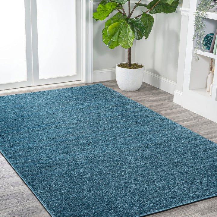 JONATHAN Y Tumbling Solid Low-Pile Area Rug