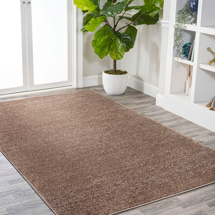 JONATHAN Y Tumbling Solid Low-Pile Area Rug
