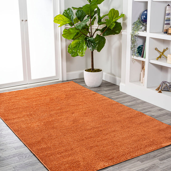 JONATHAN Y Tumbling Solid Low-Pile Area Rug