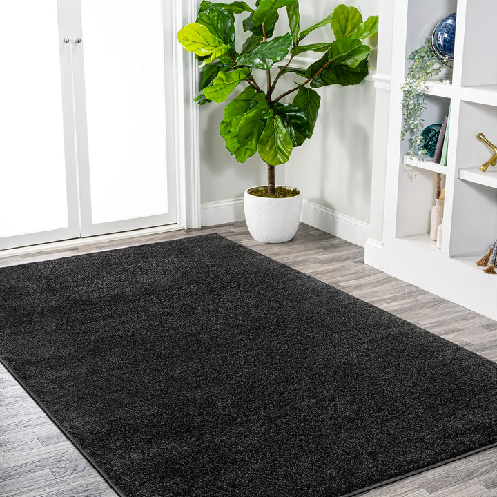 JONATHAN Y Tumbling Solid Low-Pile Area Rug